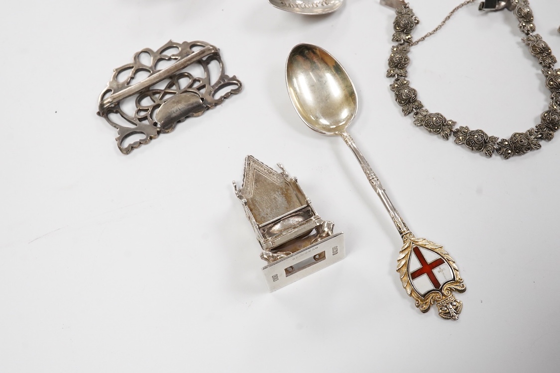 A small group of silver including an Edwardian miniature model of a throne by Edward Foligne Braham, Birmingham, 1901, 50mm, a small comport, one part of a belt buckle and three commemorative spoons, together with a gilt